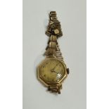 A Vintage lady's 1930's 18ct gold cased wrist watch with octagonal gilt dial on rolled gold