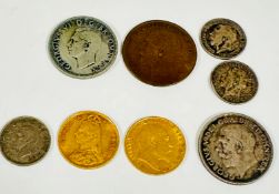 A collection of coins including a Queen Victoria gold half sovereign 1887, an Edward the VII gold