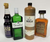 A group of Spirits and liqueurs including a bottle of Casino Royale, with vodka, blackcurrant, guava