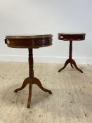A pair of Georgian style hardwood drum table, the plate glass top over two frieze drawers, raised