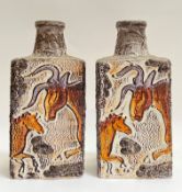 A pair of West German pottery Scheurich 'Montignac' fat lava vases of rectangular form depicting