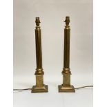 A pair of table lamps formed as reeded columns, H49cm