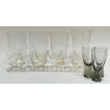 A mixed group of drinking glasses comprising four tumblers (three with engraved grapevine decoration