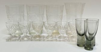 A mixed group of drinking glasses comprising four tumblers (three with engraved grapevine decoration