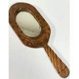 A WWI Prisoner of War oak relief carved hand mirror dated 1918 and Trouville with spiral tapered