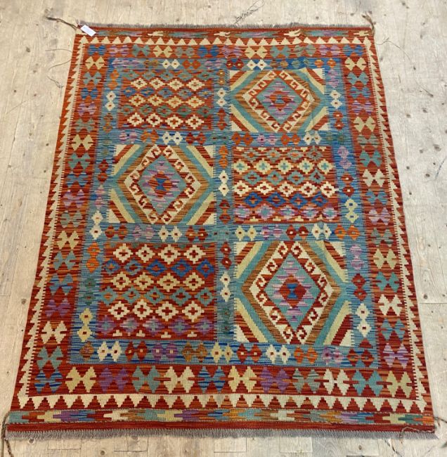 A Chobi kilim rug, of typical geometric design 197cm x 150cm