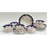 A John Ridgway & Co Cauldon Place gilt bone china 'Chantilly' part tea set with blue underglaze