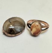 A 9ct gold ring set oval polished hardstone cabouchon in rubover setting, size P and an Edwardian