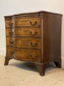 A Hepplewhite revival mahogany chest of drawers of serpentine outline, early 20th century, with a