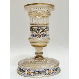 A continental enamelled glass chalice form centrepiece decorated with polychrome floral swags and