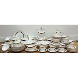 A large Royal Doulton 'Harlow' gilt tea & dinner service comprising twelve dinner plates (w-