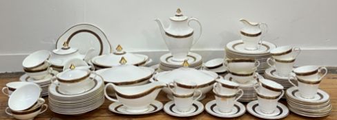 A large Royal Doulton 'Harlow' gilt tea & dinner service comprising twelve dinner plates (w-