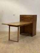 An unusual mid 20th century oak veneered folding cabinet desk, the modular two drawer chest over a