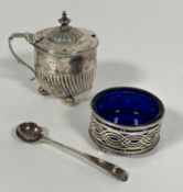 A Victorian Birmingham silver half spiral lobed drum mustard with urn finial raised on four ball