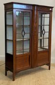 An Edwardian mahogany display cabinet, the frieze and centre inlaid with boxwood harebell swags,