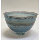 A Lindean Mill hand-blown footed blue glass bowl decorated with a stripy black and white rim. (h-