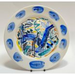 Caroline McNairn (1955-2010), a hand painted/enamelled plate with abstract design of a figure with