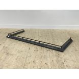 A Victorian style cast metal fire curb with rope twist gallery, aperture 162cm x 68cm