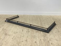 A Victorian style cast metal fire curb with rope twist gallery, aperture 162cm x 68cm