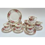 A Queen Anne Summer Rose pattern china part tea service comprising six tea cups, six saucers and six