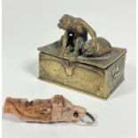 A Eastern Fratha cast brass miniature box, the top mounted with Ape holding a sack, lid loose, (h
