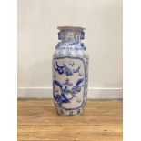 A large Chinese style blue and white ceramic floor vase, with ruyie borders and two relief moulded