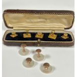 A set of five 9ct gold dress studs in original fitted case and a set of four mother of pearl gilt