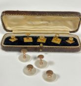 A set of five 9ct gold dress studs in original fitted case and a set of four mother of pearl gilt