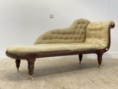 A mid 19th century mahogany framed chaise longue, the undulating back and scrolled show frame