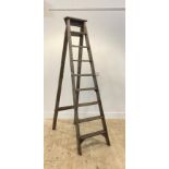 An early 20th century pine set of eight rung decorators step ladders Height when closed 209cm