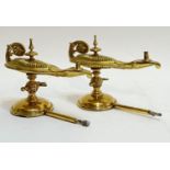 A pair of late nineteenth/early twentieth century lacquered brass Adam style table mounted gas cigar