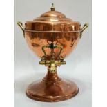 A Victorian copper samovar/tea urn with brass handles and knop (h- 33cm, w- 26cm)