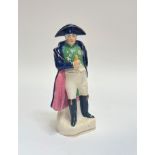 A Staffordshire standing figure of Napoleon decorated with polychrome enamels (h- 20cm)