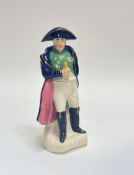 A Staffordshire standing figure of Napoleon decorated with polychrome enamels (h- 20cm)