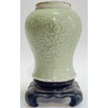 An antique Chinese Yuan style carved porcelain/stoneware meiping baluster vase with Longquan style