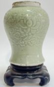 An antique Chinese Yuan style carved porcelain/stoneware meiping baluster vase with Longquan style