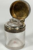 An Edwardian crystal dimpled glass face cream jar complete with original glass stopper with London