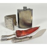 An Epns curved hip flask with engine turned decoration and screw down top, ( h x 14cm x l 9cm), a