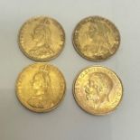 A group of three Queen Victoria gold sovereigns, 1887, 1889, 1894 and a George V gold sovereign