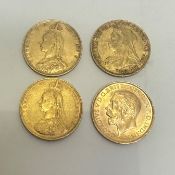 A group of three Queen Victoria gold sovereigns, 1887, 1889, 1894 and a George V gold sovereign