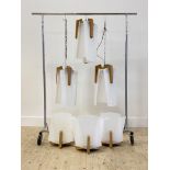 A set of three vintage beech and opalescent acrylic pendant light fittings, (H53cm) together with