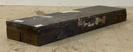 A 19th century iron bound stained pine shotgun case, the lid with old paper labels and badge