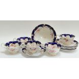 A John Ridgway & Co Cauldon Place gilt bone china 'Chantilly' part tea set with blue underglaze