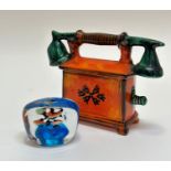 A ceramic telephone money-box with orange and green decoration (w- 21cm h- 17cm) and a under water