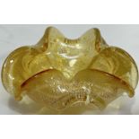 A Venetian Murano Vetro Artistico glassworks blown art glass bowl with gold leaf encased in clear