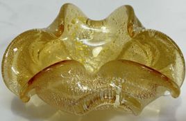 A Venetian Murano Vetro Artistico glassworks blown art glass bowl with gold leaf encased in clear