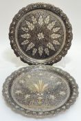 A pair of Indo-Persian niello trays, possibly Kashmiri, decorated with scrolling foliate motifs on a