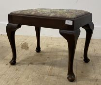 An early 20th century stool with drop in seat pad, raised on cabriole supports H37cm