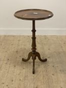 A Victorian mahogany wine table, the circular tray top raised on turned column and triple splay