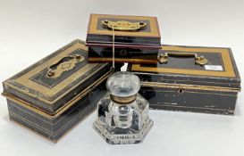 A group of three toleware money boxes, together with a large cut glass ink well (4)
